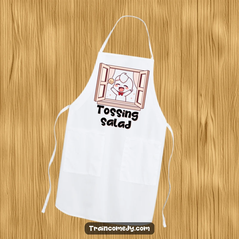 Funny apron depicting a giggling character playfully tossing a plush toy out of a window, suitable for kitchen fun.