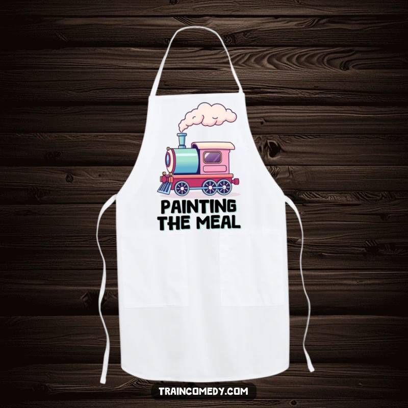 Funny kitchen apron featuring a train engine emitting a puff of rainbow smoke. Whimsical and practical for culinary adventures.