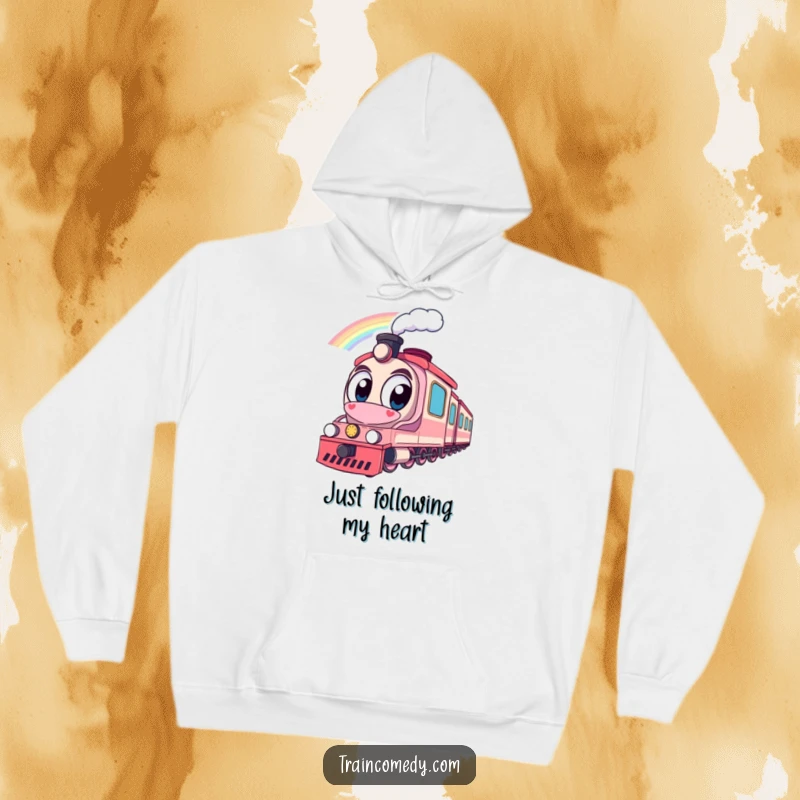 Funny hoodie showcasing a train with wide eyes observing a stunning rainbow, evoking feelings of awe and happiness for cozy wear.