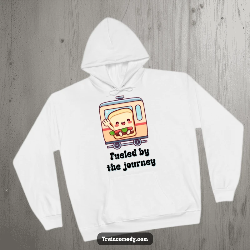Funny hoodie depicting a sandwich character in a train car, enthusiastically waving goodbye, offering cozy and humorous travel vibes.