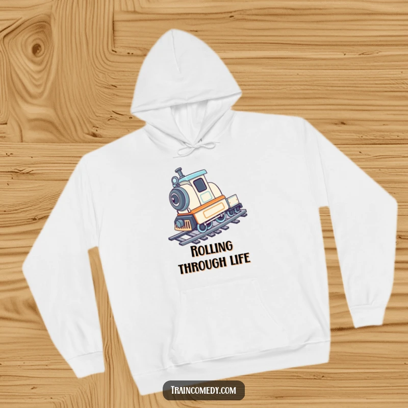 Playful train character performing a cartwheel on its tracks, depicted on a cozy hoodie.