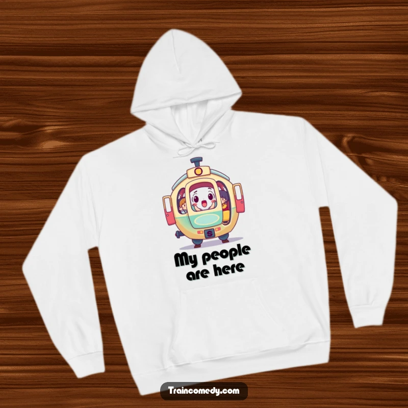 Funny hoodie showing a surprised, round train car with its doors open, colorful passengers inside, offering warmth and humorous style.