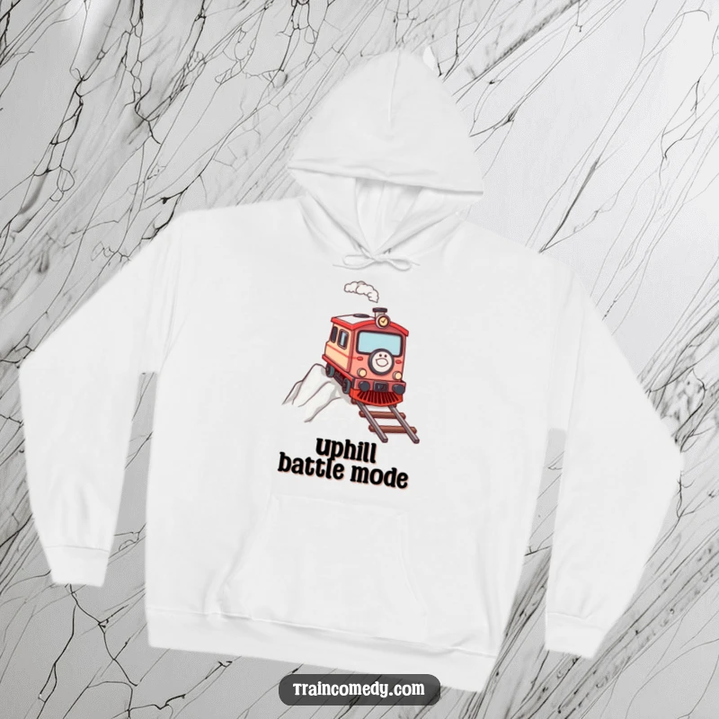 Determined train character chugging up a steep incline, depicted on a cozy hoodie.