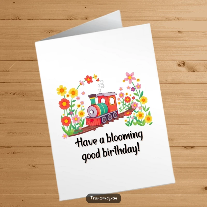 Funny Free Printable Birthday Card: A train happily travels through a tunnel of vibrant, colorful flowers, spreading cheer.