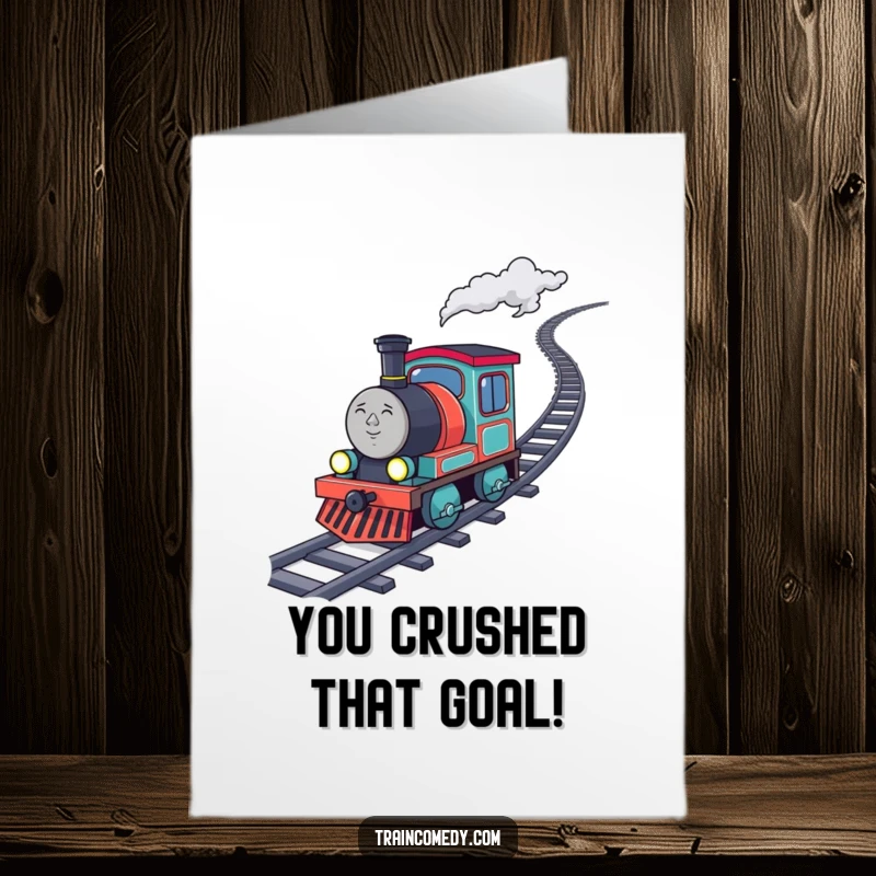 Funny free printable congratulations card depicting a determined train character conquering an uphill climb, leaving a trail of sparkling coal behind.