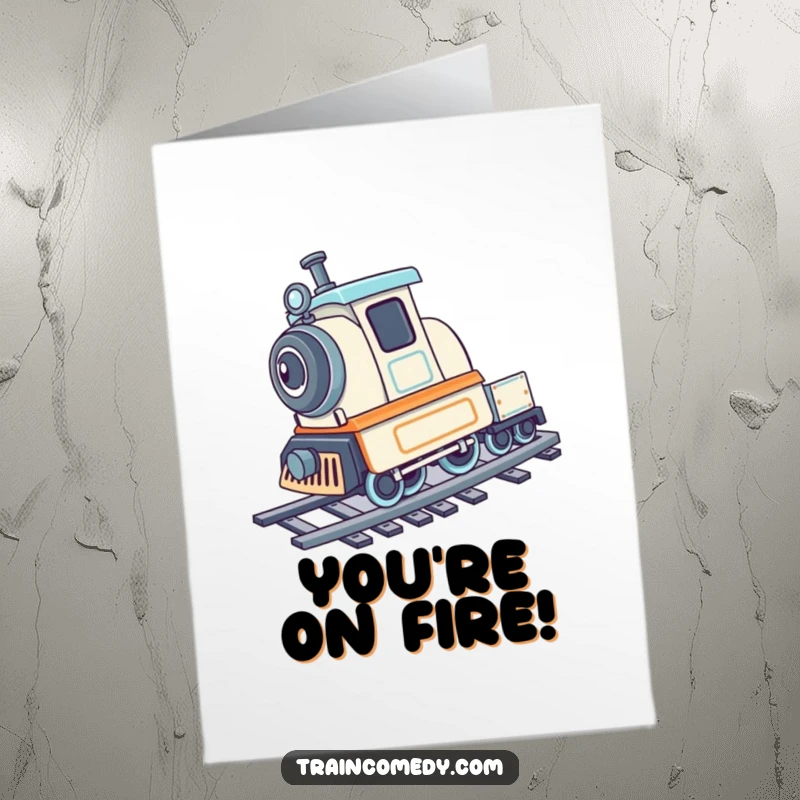Funny Free Printable Congratulations Card: A playful train performs a cartwheel on its tracks, cheering your success.