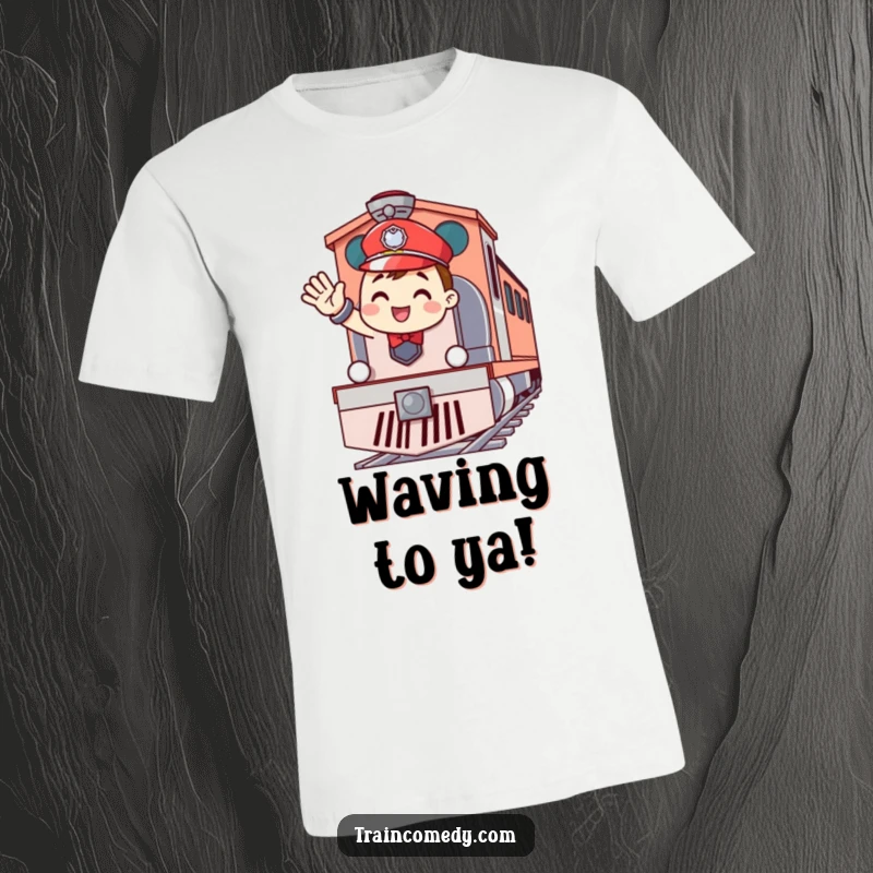 Funny t-shirt featuring a cheerful train conductor waving enthusiastically from the front of a train engine, radiating warmth and humor.